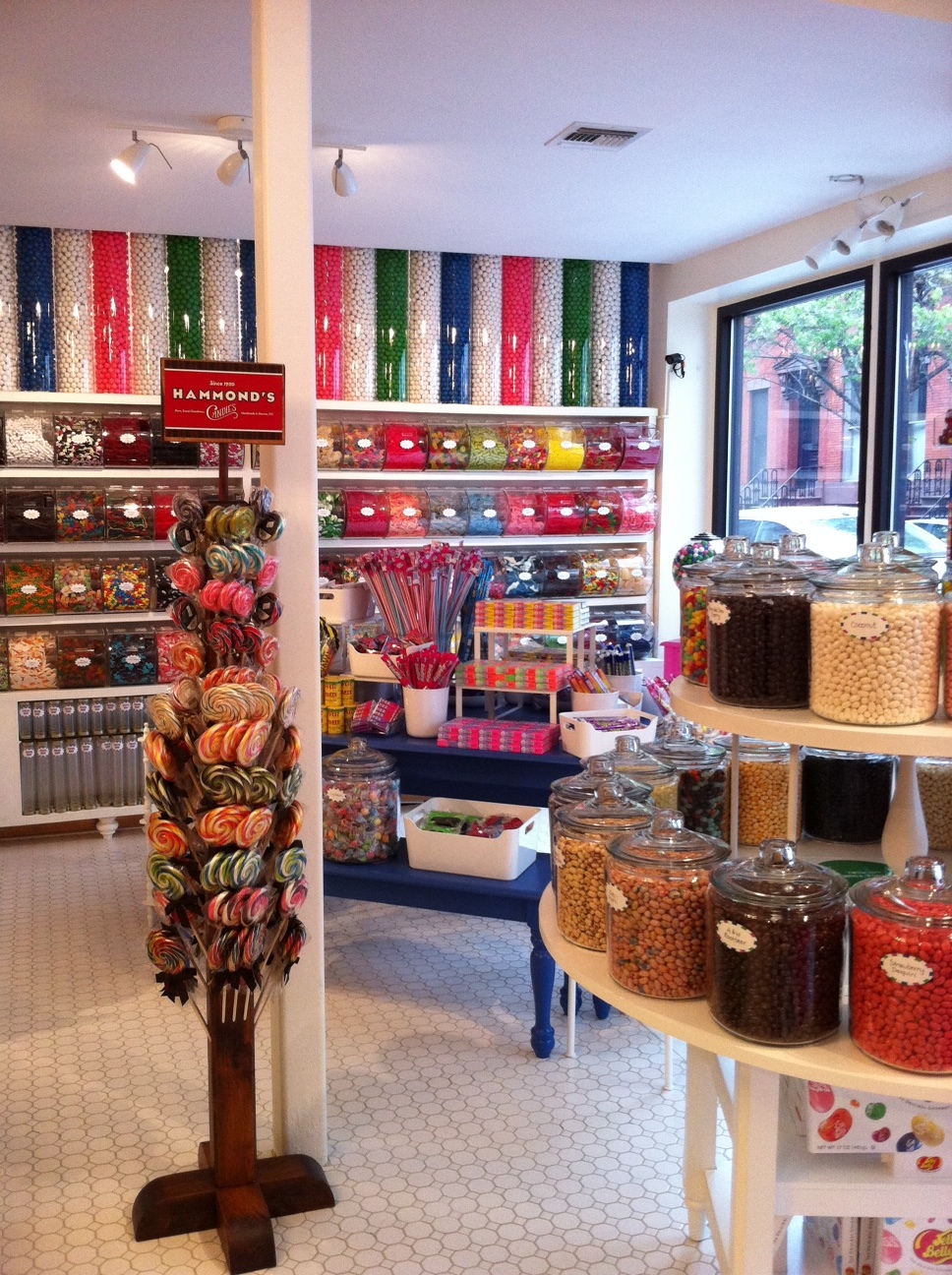 Shelves and jars of colourful bulk candy inside a Brooklyn candy store